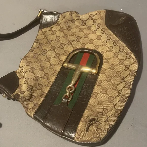 Authentic well used good condition Gucci medium hobo logo purse